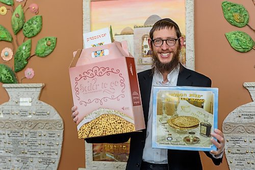 JESSE BOILY  / WINNIPEG FREE PRESS
Rabbi Boruch Heidingsfeld poses with the seder kits at Chabud- Lubavitch of Winnipeg on Monday. Monday, April 6, 2020. Due to the COVID-19 pandemic passover is being adapted so many are using the seder kits for at home meals this year.
Reporter: Brenda Suderman