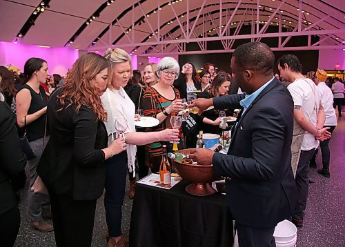 JASON HALSTEAD / WINNIPEG FREE PRESS

Attendees check out the wine selections at the Women, Wine and Food for International Women's Day event hosted by the Women's Health Clinic at the Manitoba Museums Alloway Hall on March 7, 2020. (See Social Page)