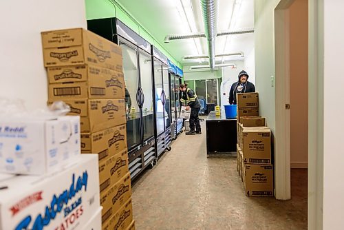 JESSE BOILY  / WINNIPEG FREE PRESS
Breigh Hicks, left, and James Favel at the Bear Clans new building which will be better supplied with industrial fridges and more space for the food bank on Tuesday. 
Reporter: Eva Wasney