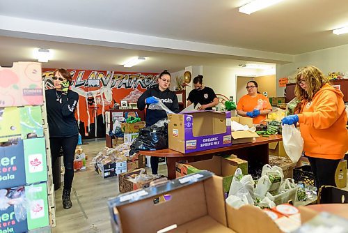 JESSE BOILY  / WINNIPEG FREE PRESS
Bear Clan prepares food for the Bear Clan food bank on Tuesday. The Bear Clan food bank has seen up to 350 people daily showing up at their door. Tuesday, April 7, 2020.
Reporter: Eva Wasney
