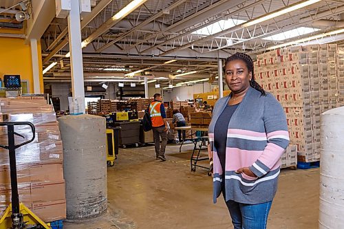 JESSE BOILY  / WINNIPEG FREE PRESS
Keren Taylor-Hughes, CEO of Winnipeg Harvest where they currently are struggling to find enough sources for food as donations are down, poses for a portrait in the Winnipeg Harvest warehouse on Wednesday. Wednesday, April 8, 2020.
Reporter: Joel Schlesinger