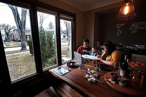 JOHN WOODS / WINNIPEG FREE PRESS
Jesse Marantz with wife Lauren and son Jack, 14 months, talk with family members on a laptop as they sit down at their COVID-19 isolated Passover Seder meal in Winnipeg Wednesday, April 8, 2020. 

Reporter: ?