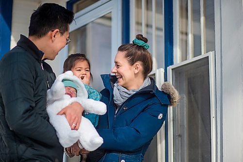 MIKAELA MACKENZIE / WINNIPEG FREE PRESS

Lauren and Geung Kroeker-Lee with their two-year-old, Sula, and 13-day-old, Lena, pose for a family photo by their new house in Wolseley in Winnipeg on Thursday, April 9, 2020.
Winnipeg Free Press 2020