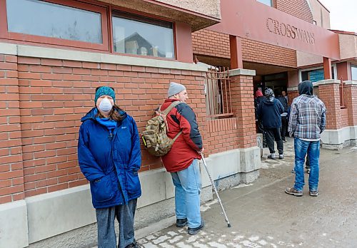 JESSE BOILY  / WINNIPEG FREE PRESS
People lined up outside of the 1JustCity lunch program, who was serving pizzas on Good Friday to those in need at their West Broadway Community Ministry on Friday. It was the first time that they had their service open on Good Friday but due to the pandemic and food shortages they deemed it important to stay open. Friday, April 10, 2020.
Reporter:n/a