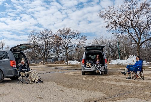 JESSE BOILY  / WINNIPEG FREE PRESS
Left to right: Amber Weiss, left, Brianna Ly, and Naomi Osask a group of mothers meet in a parking lot at Assiniboine Park while keeping social distant on Friday. Friday, April 10, 2020.
Reporter: