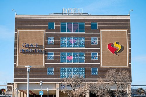 Daniel Crump / Winnipeg Free Press. Hearts and signs with messages of encouragement can be seen adorning the south side of the Grace Hospital, from Portage Avenue. April 10, 2020.