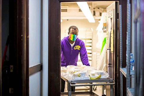 MIKAELA MACKENZIE / WINNIPEG FREE PRESS

Community organizer Raymond Ngabou serves up free lunch at Knox Church in Winnipeg on Wednesday, April 15, 2020. For Brenda Suderman story.
Winnipeg Free Press 2020