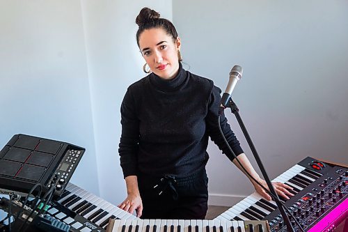 MIKAELA MACKENZIE / WINNIPEG FREE PRESS

Rayannah, the first musician in Manitoba Music's Live Streaming series, poses for a portrait in her home studio in Winnipeg on Wednesday, April 15, 2020. For Jen Zoratti story.
Winnipeg Free Press 2020