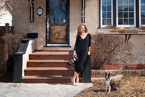 MIKE DEAL / WINNIPEG FREE PRESS
Posing with her dog, Otto, on her front porch, local photographer Kristen Sawatzky photographed local families as part of The Front Steps Project. Respecting strict physical distancing, images from the sessions were exchanged for a donation to a local charity. All photos were taken between March 25-31. 
See Sabrina Carnevale story
200415 - Wednesday, April 15, 2020.