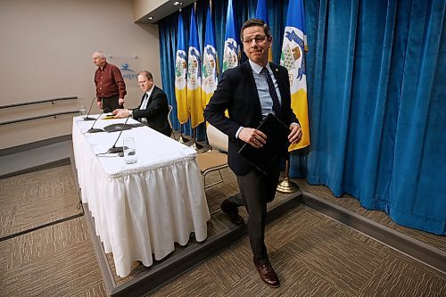 JOHN WOODS / WINNIPEG FREE PRESS
Mayor Brian Bowman and Mike Ruta, interim Chief Administrative Officer (CAO), leave after announcing the City of Winnipegs employment plan going forward during a COVID-19 press conference at City Hall in Winnipeg Wednesday, April 15, 2020. 

Reporter: Pursaga