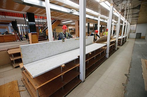 JOHN WOODS / WINNIPEG FREE PRESS
Crews demolish shelving in the old Mitchell Fabric building to make way for a new Main Street Project womens shelter  in Winnipeg Thursday, April 16, 2020. 

Reporter: Thorpe