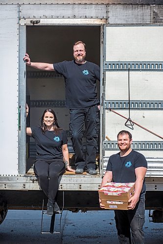 MIKAELA MACKENZIE / WINNIPEG FREE PRESS

Dana Benne, sales and service (left), Steven Benne, owner, and Chris Bonwick, associate driver, of Milk Man Distributors Ltd. pose for a portrait in Winnipeg on Friday, April 17, 2020. The milkman scene is making a return due to the pandemic, and this family-run business delivers milk city-wide.
Winnipeg Free Press 2020