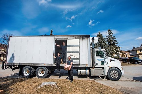 MIKAELA MACKENZIE / WINNIPEG FREE PRESS

Dana Benne, sales and service (left), Steven Benne, owner, and Chris Bonwick, associate driver, of Milk Man Distributors Ltd. pose for a portrait in Winnipeg on Friday, April 17, 2020. The milkman scene is making a return due to the pandemic, and this family-run business delivers milk city-wide.
Winnipeg Free Press 2020