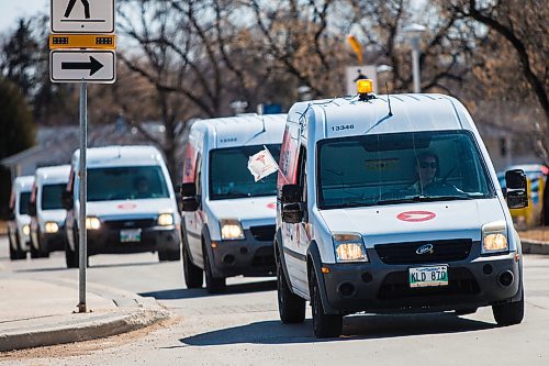 MIKAELA MACKENZIE / WINNIPEG FREE PRESS

Canada Post employees from the Moray Street depot do a drive-by tribute to support frontline workers at the Grace Hospital in Winnipeg on Wednesday, April 22, 2020. Standup.
Winnipeg Free Press 2020