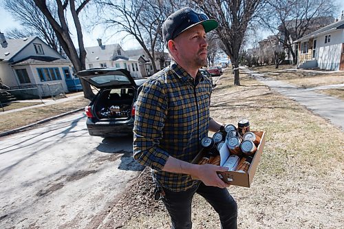JOHN WOODS / WINNIPEG FREE PRESS
Ben Sigurdson, Winnipeg Free Press writer, delivers an order for Torque Brewing Co. in Winnipeg Wednesday, April 22, 2020. COVID-19 has shutdown on-site serving in bars and restaurants and some local brew companies have been delivering their goods to their customers homes. Sigurdson took to the streets and delivered Torques daily order.

Reporter: Sigurdson