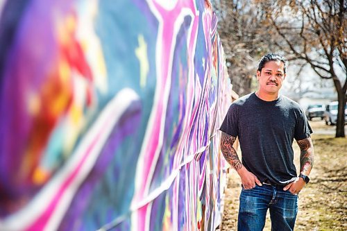 MIKAELA MACKENZIE / WINNIPEG FREE PRESS

Pat Lazo, artistic director of the Graffiti Gallery, poses with the COVID-19 mural he painted in his home community of Riverview in Winnipeg on Thursday, April 23, 2020. For Danielle Da Silva story.
Winnipeg Free Press 2020