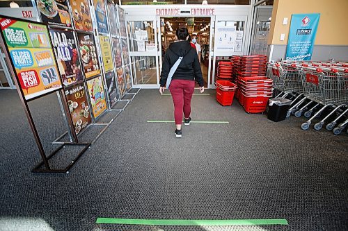 JOHN WOODS / WINNIPEG FREE PRESS
Lines on the entrance floor at Seafood City in Winnipeg Thursday, April 23, 2020. Seafood City have taken great steps to ensure the safety of their customers and staff.

Reporter: Abas