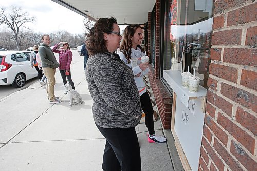 JOHN WOODS / WINNIPEG FREE PRESS
Angie Banman and her daughter Kaitlynn get some ice cream on opening day at Sargent Sundae in Winnipeg Sunday, April 26, 2020. 

Reporter: Allen