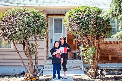 MIKAELA MACKENZIE / WINNIPEG FREE PRESS

Luanne Hall and her eight-year-old daughter, Journey Poole, pose for a portrait in front of their house in Winnipeg on Monday, April 27, 2020. Since Luanne couldnt have her regular birthday party, she fundraised $791 that will be donated to firefighters instead. For Doug Spiers story.

Winnipeg Free Press 2020