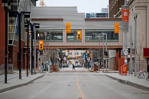 JOHN WOODS / WINNIPEG FREE PRESS
Light traffic as a pedestrian crosses Graham Ave Tuesday, April 28, 2020. 

Reporter: Thorpe