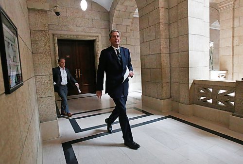 MIKE DEAL / WINNIPEG FREE PRESS
Premier Brian Pallister heads to his media conference in the Manitoba legislative building where he announced his plan to start easing restrictions on businesses during the COVID-19 pandemic. 
200429 - Wednesday, April 29, 2020.