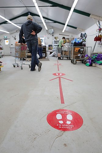RUTH BONNEVILLE  /  WINNIPEG FREE PRESS 

Ent - Gardening, T&T, Jarrett Davidson

Photo of centre's social-distancing plans in place with markers on the floor. 

Gardening feature for Saturday's arts front. 
Jarrett Davidson, the president of T&T Seeds,  has seen their business explode with orders from across Canada, and expects a busy spring as people with nothing to do are heading to their gardens.

Story by Alan Small

April 29th,  2020
