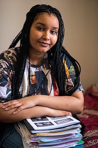 MIKAELA MACKENZIE / WINNIPEG FREE PRESS

Nyat Birhane, a grade 11 student at St. John's High School, poses for a portrait in her home in Winnipeg on Thursday, April 30, 2020. Nyat and her older sister do their schoolwork in the bedroom, where they also share a laptop. For Maggie Macintosh story.

Winnipeg Free Press 2020