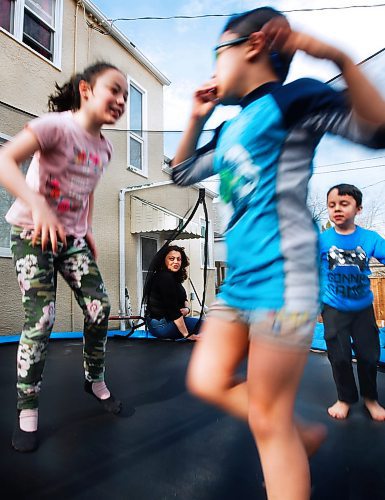 JOHN WOODS / WINNIPEG FREE PRESS
Marina Havard and her children Jayden, 7, centre, Quinn, 5, right, and Zen, 9 are photographed in their backyard Thursday, April 30, 2020. Havard is frustrated the province is lifting restrictions on business while putting education and family support on the back burner of COVID-19 response. 

Reporter: De Silva