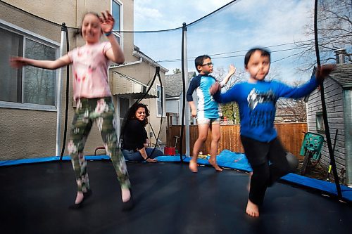 JOHN WOODS / WINNIPEG FREE PRESS
Marina Havard and her children Jayden, 7, centre, Quinn, 5, right, and Zen, 9 are photographed in their backyard Thursday, April 30, 2020. Havard is frustrated the province is lifting restrictions on business while putting education and family support on the back burner of COVID-19 response. 

Reporter: De Silva