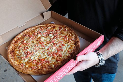 Daniel Crump / Winnipeg Free Press. A large tomato and feta pizza from A Little Pizza Heaven. April 30, 2020.