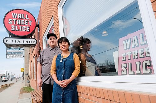 Daniel Crump / Winnipeg Free Press. Michael Sung (left) and Edelma Miranda, co-owners or Wall Street Slice, stand for a photo outside their shop. April 30, 2020.
