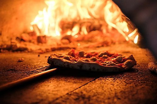 Daniel Crump / Winnipeg Free Press. A margherita pizza makes in a wood fired oven at Pizzeria Gusto. April 30, 2020.