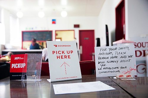 MIKAELA MACKENZIE / WINNIPEG FREE PRESS

Pickup order information at Sandy Lou's Diner in Winnipeg on Friday, May 1, 2020. The diner's only been open six months, but has already had its share of adversity, first getting into a dispute with their original landlord at a downtown hotel, forcing them to vacate that premises after only three months, then getting hit with COVID two weeks after opening at their second location, inside the LaSalle Hotel. For Dave Sanderson story.

Winnipeg Free Press 2020