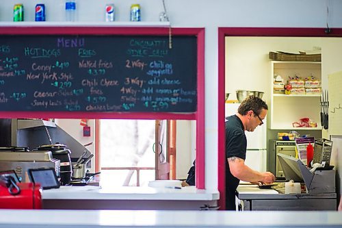 MIKAELA MACKENZIE / WINNIPEG FREE PRESS

Fraser Mason, owner of Sandy Lou's Diner, puts together a plate of Cincinnati-style chili in Winnipeg on Friday, May 1, 2020. The diner's only been open six months, but has already had its share of adversity, first getting into a dispute with their original landlord at a downtown hotel, forcing them to vacate that premises after only three months, then getting hit with COVID two weeks after opening at their second location, inside the LaSalle Hotel. For Dave Sanderson story.

Winnipeg Free Press 2020