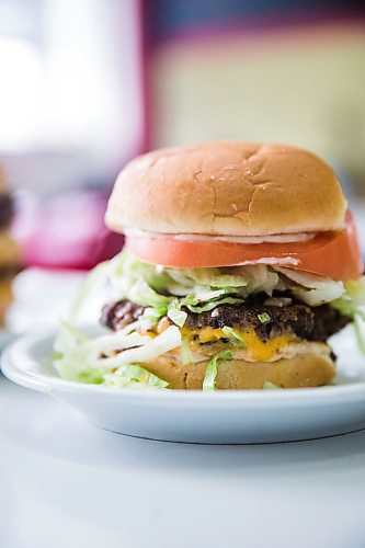 MIKAELA MACKENZIE / WINNIPEG FREE PRESS

A fatboy burger at Sandy Lou's Diner in Winnipeg on Friday, May 1, 2020. The diner's only been open six months, but has already had its share of adversity, first getting into a dispute with their original landlord at a downtown hotel, forcing them to vacate that premises after only three months, then getting hit with COVID two weeks after opening at their second location, inside the LaSalle Hotel. For Dave Sanderson story.

Winnipeg Free Press 2020