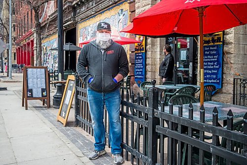 MIKAELA MACKENZIE / WINNIPEG FREE PRESS

Chris Graves, owner of the King's Head, on the newly opened patio in Winnipeg on Monday, May 4, 2020. For JS story.

Winnipeg Free Press 2020