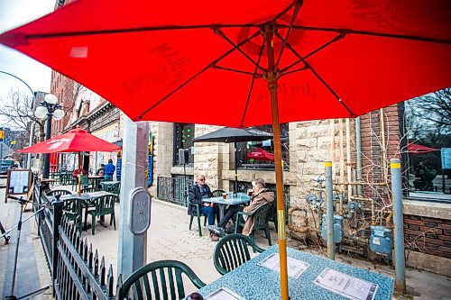 MIKAELA MACKENZIE / WINNIPEG FREE PRESS

People enjoy a drink on the newly opened King's Head patio in Winnipeg on Monday, May 4, 2020. For JS story.

Winnipeg Free Press 2020