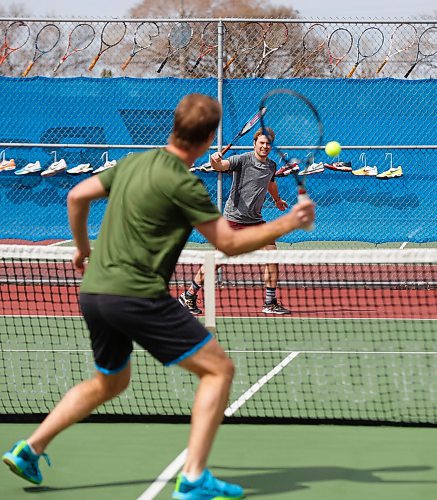 MIKE DEAL / WINNIPEG FREE PRESS
Tennis players Kevin Kylar (right) and Evan Mancer (left) are happy to finally get a chance to knock the ball around at the Sargent Park Tennis Courts Monday afternoon.
See Taylor Allen story
200504 - Monday, May 04, 2020.