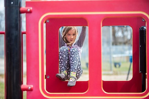 MIKAELA MACKENZIE / WINNIPEG FREE PRESS

Anni Quinn (six) plays on a newly re-opened playground at the Riverview Community Centre in Winnipeg on Monday, May 4, 2020. For JS story.

Winnipeg Free Press 2020