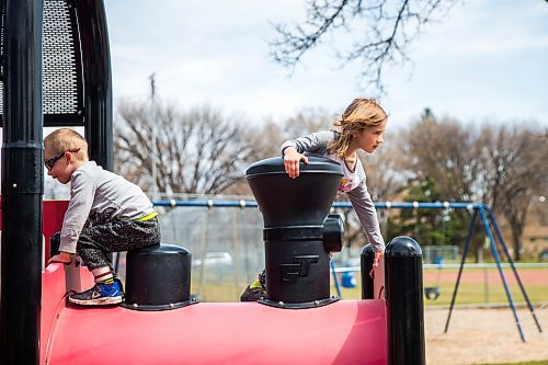 MIKAELA MACKENZIE / WINNIPEG FREE PRESS
Four-year-old Wade Quinn (left) and his sister, Anni Quinn (six) play on a newly re-opened playground at the Riverview Community Centre in Winnipeg on Monday, May 4, 2020. For JS story.
Winnipeg Free Press 2020