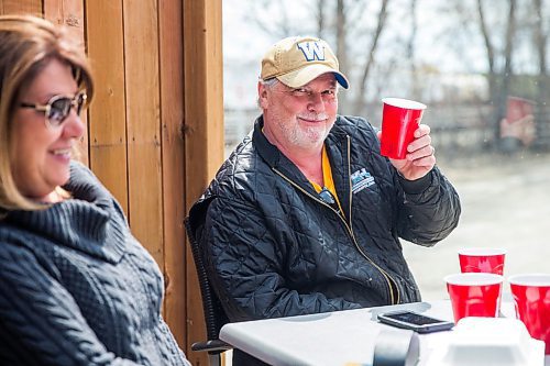 MIKAELA MACKENZIE / WINNIPEG FREE PRESS

Mark Sealey (right) and Jan Mikawos enjoy the sun on Smitty's patio in Winnipeg on Monday, May 4, 2020. For JS story.

Winnipeg Free Press 2020