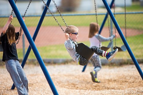 MIKAELA MACKENZIE / WINNIPEG FREE PRESS

Wade Quinn (four) plays on a newly re-opened playground with his siblings at the Riverview Community Centre in Winnipeg on Monday, May 4, 2020. For JS story.

Winnipeg Free Press 2020