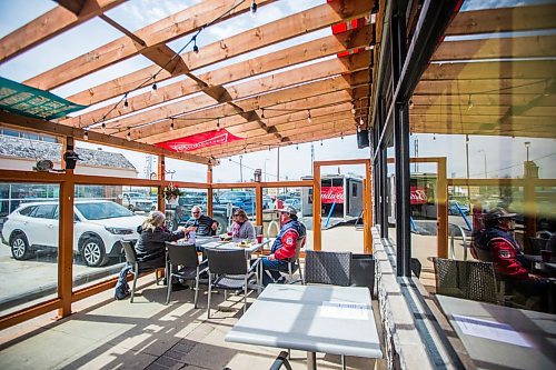 MIKAELA MACKENZIE / WINNIPEG FREE PRESS

Folks enjoy the sun on Smitty's patio in Winnipeg on Monday, May 4, 2020. For JS story.

Winnipeg Free Press 2020