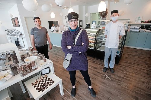 JOHN WOODS / WINNIPEG FREE PRESS
Constance Menzies, centre, owner of Chocolatier Constance Popp, is photographed at her St Boniface chocolate shop with staff members Ray Tara, left, and Paul Lorteau in Winnipeg Monday, May 4, 2020. Menzies is worried her shop will not survive the economic fallout of COVID-19 and has launched a social funding (GoFundMe) page.

Reporter: Speirs