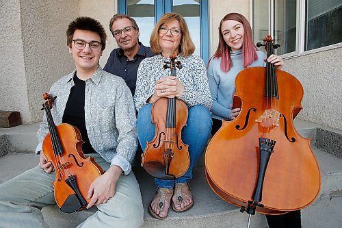 JOHN WOODS / WINNIPEG FREE PRESS
Gwen Hoebig, concertmaster of the WSO, and David Moroz, piano professor at the U of MB, with their children Juliana and Alexander, who perform as the JAGD Quartet are photographed at their home in Winnipeg Tuesday, May 5, 2020. 

Reporter: Small