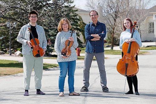 JOHN WOODS / WINNIPEG FREE PRESS
Gwen Hoebig, concertmaster of the WSO, and David Moroz, piano professor at the U of MB, with their children Juliana and Alexander, who perform as the JAGD Quartet are photographed at their home in Winnipeg Tuesday, May 5, 2020. 

Reporter: Small