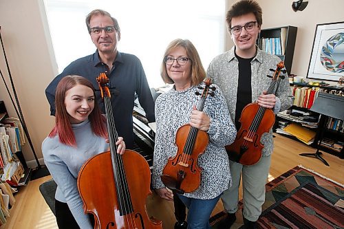 JOHN WOODS / WINNIPEG FREE PRESS
Gwen Hoebig, concertmaster of the WSO, and David Moroz, piano professor at the U of MB, with their children Juliana and Alexander, who perform as the JAGD Quartet are photographed at their home in Winnipeg Tuesday, May 5, 2020. 

Reporter: Small