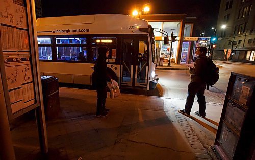MIKE DEAL / WINNIPEG FREE PRESS
24-hr project
Midnight bus ride in Winnipeg.
Just after midnight on Wednesday, May 6th, people wait for their bus to arrive at the Graham Avenue bus stop in Downtown Winnipeg.
See Grant Burr story
200505 - Tuesday, May 05, 2020.