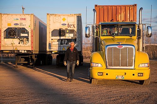 MIKAELA MACKENZIE / WINNIPEG FREE PRESS

Trucker Alain Blair hooks up the trailer for his first job of the day at Trappers Transport in Winnipeg on Wednesday, May 6, 2020. For Dean story.

Winnipeg Free Press 2020