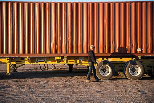 MIKAELA MACKENZIE / WINNIPEG FREE PRESS

Trucker Alain Blair hooks up the trailer for his first job of the day at Trappers Transport in Winnipeg on Wednesday, May 6, 2020. For Dean story.

Winnipeg Free Press 2020